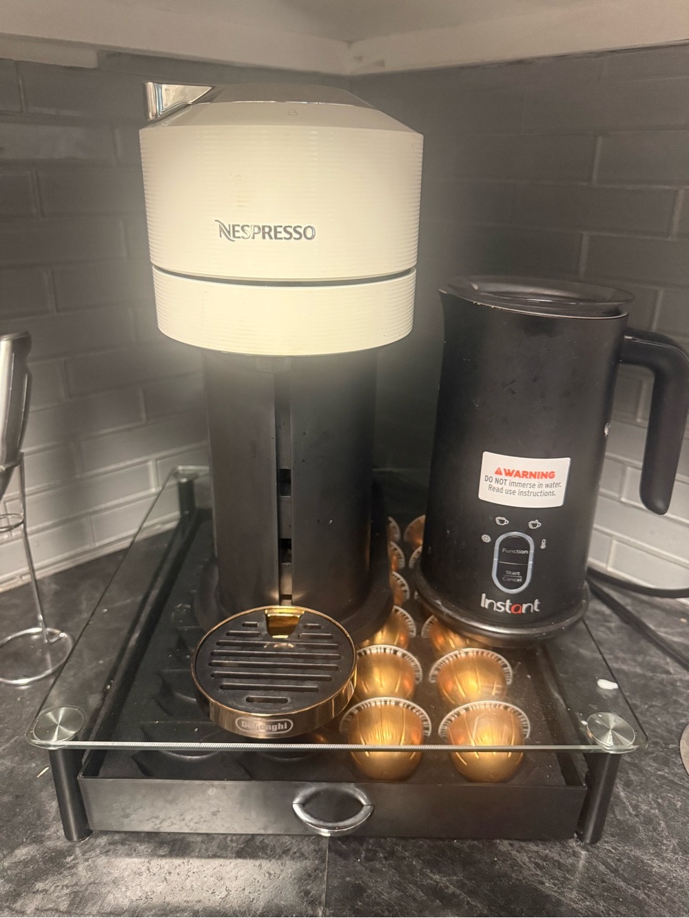 Nespresso Vertuo Coffee Maker in White and Black with Black Milk Frother